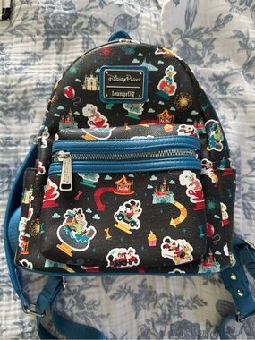 Loungefly Black Backpack with blue Accents and Multicolor Park Print